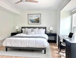 Spacious bedroom with a king bed and desk - great for an extended stay!