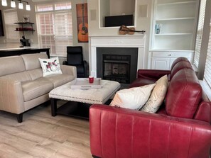 Living room with nice coffee or wine table to gather