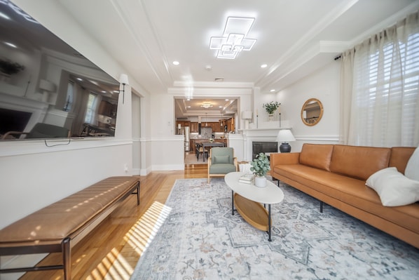 Gather in this open space Living room kitchen.