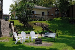 Backyard - View of house from fire pit (don't forget the firewood and S'mores!)