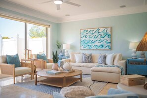 Sophisticated, coastal living room - watch the sunset over the ocean.