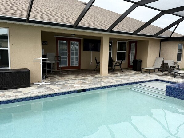Outdoor pool 65" TV