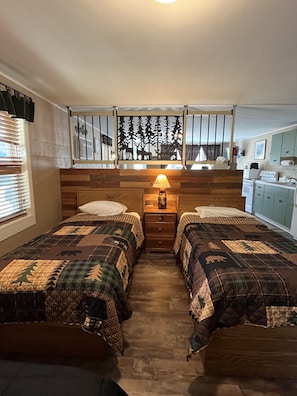 Bed room has 3 twin beds