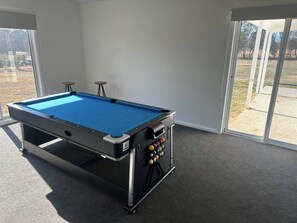 Convertible billiards / air-hockey table. Have a great time in any weather conditions