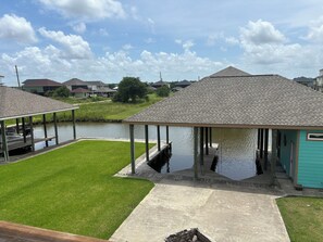 Boat slips, boathouse, dock and backyard