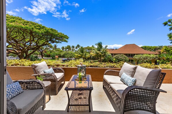 Relax and unwind in the shared lanai area—perfect for enjoying the warm Maui breeze and lush surroundings.