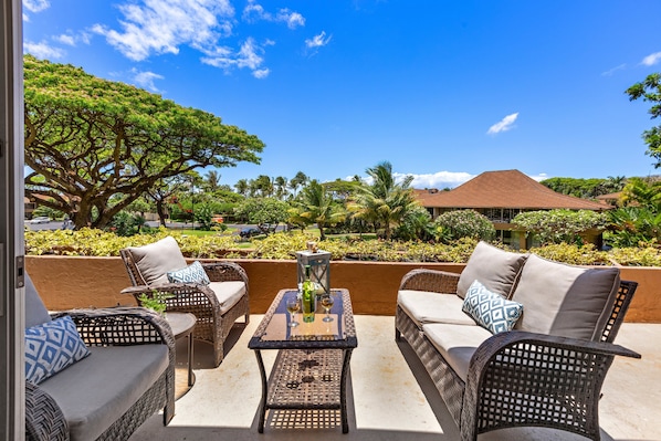 Relax and unwind in the shared lanai area—perfect for enjoying the warm Maui breeze and lush surroundings.