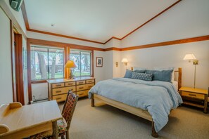 Start your mornings with serene lake views right from the king bed in the primary suite