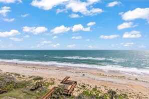 Seawinds offers direct oceanfront access on no-drive Ormond Beach, with a private beach boardwalk just steps from your condo