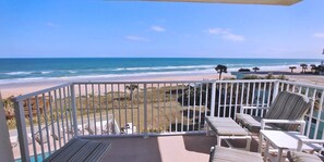 Soak up stunning Atlantic Ocean views from your private 3rd-floor corner balcony overlooking the sparkling Seawinds pool