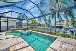 A stunning pool offering breathtaking views of the canal.