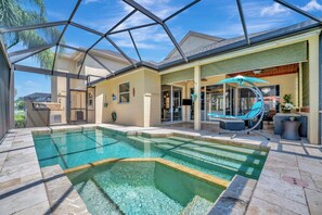 Modern heated pool. It is designed for year-round use and adds warmth.