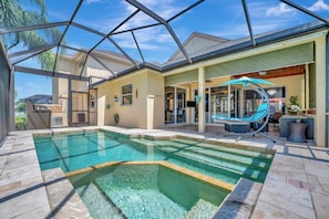 Modern heated pool. It is designed for year-round use and adds warmth.