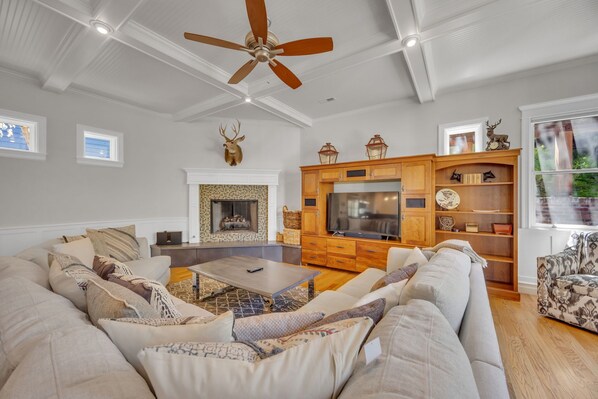 Living room 1: Main floor, Gas fireplace, Smart TV, Sonos sound system, patio access