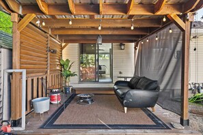 Gather, grill, and unwind in this cozy outdoor gazebo space.