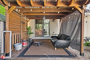 Gather, grill, and unwind in this cozy outdoor gazebo space.