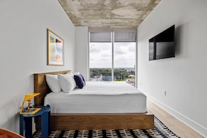King bed with city views