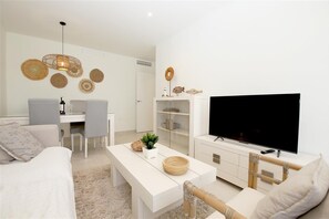 Bright and modern lounge with seating area and dining area