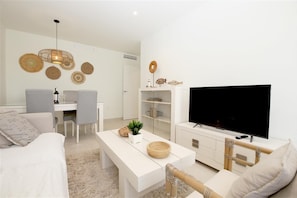 Bright and modern lounge with seating area and dining area