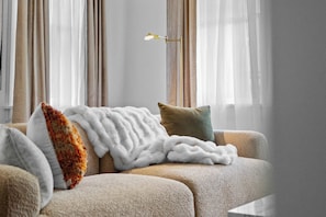 "Unwind in sophisticated comfort and timeless style."
