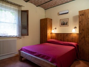 Furniture, Bed, Bedroom, Wall, Interior Design, Wood, Bed Sheet, Bedding, Room, Flooring