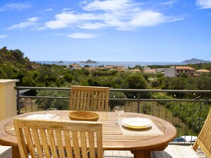 Furniture, Table, Chair, Kitchen & Dining Room Table, Outdoor Table, Outdoor Furniture, Shade, Wood Stain, Balcony, Eco Hotel