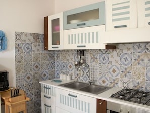 Kitchen, Major Appliance, Flooring, Tile, Countertop, Kitchen Appliance, Cabinetry, Sink, Kitchen Stove, Plumbing Fixture