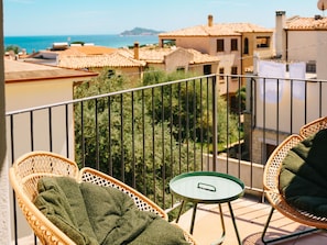 Furniture, Balcony, Apartment, Outdoor Furniture, Chair, Wood Stain, Shade, Porch, Villa, Houseplant