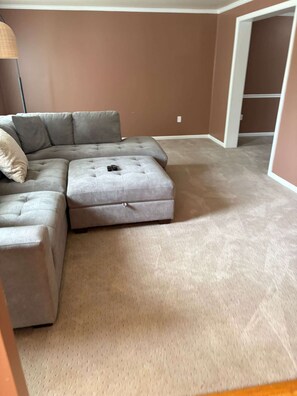 comfortable living area with cozy seating, warm lighting, and a relaxed atmosphere; perfect for unwinding after a day of exploring.