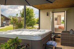 Jump into the hot tub, let the steam rise, and watch the world slow down.