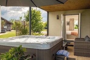 Jump into the hot tub, let the steam rise, and watch the world slow down.