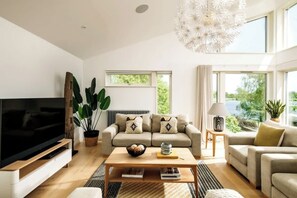Step into your living space - a light-filled, open-plan, calm space to gather, stretch out, and let the day unfold.