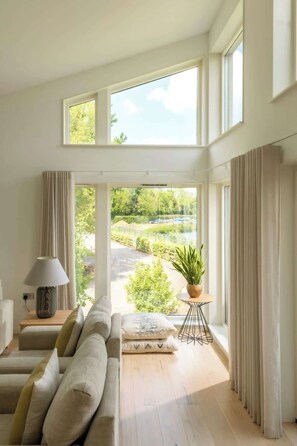 Panoramic windows overlooking the countryside, and bringing lots