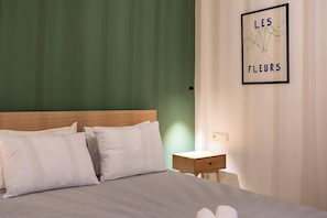 Sleep soundly in this thoughtfully designed bedroom with soft textures and gentle lighting.