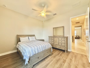 A perspective of the bedroom layout and its connection to the adjacent room.