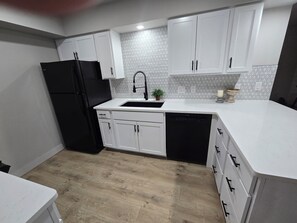 Bright, newly renovated kitchen makes dining-in fun! Fully equipped