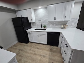 Bright, newly renovated kitchen makes dining-in fun! Fully equipped