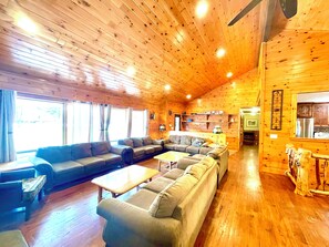 Plenty of seating in main living room, TV with roku remote and DVD player