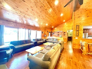 Plenty of seating in main living room, TV with roku remote and DVD player