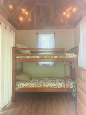 Twin bunk beds in private space