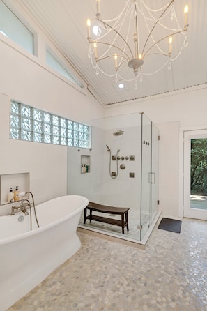 Relax in our extravgant master bath with deep tub and walk-in rain shower.