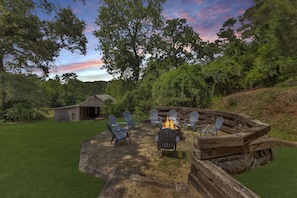 Have family/friend time at our camp side fire-pit. Wood not provided.