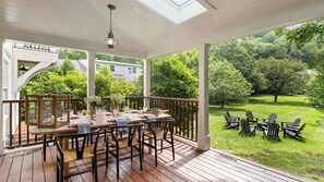 Enclosed porch overlooking stunning backyard
