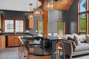 Kitchen with granite counter tops, endless amenities including of course... margarita glasses!