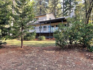 View from backyard of large deck.