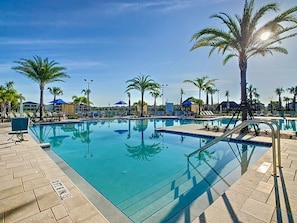 Relax and unwind in this stunning resort pool oasis!