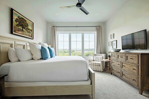 Drift off in comfort on a plush king-sized bed, complete with premium linens, soft pillows, and plenty of space to stretch out and relax after a day of exploring.