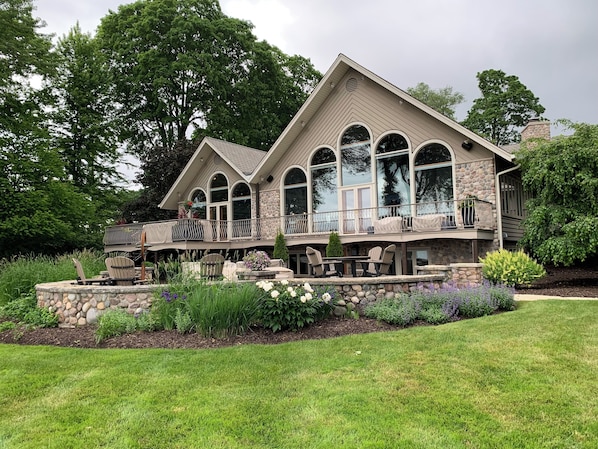 Lake-side/backyard of home , deck, and patio.