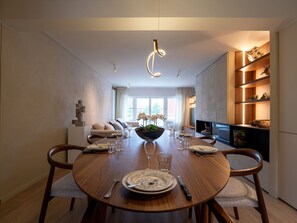 Interior Design, Light Fixture, Ceiling, Lighting, Furniture, Chandelier, Kitchen & Dining Room Table, Room, Chair, Dining Room
