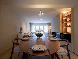 Interior Design, Light Fixture, Ceiling, Lighting, Furniture, Chandelier, Kitchen & Dining Room Table, Room, Chair, Dining Room